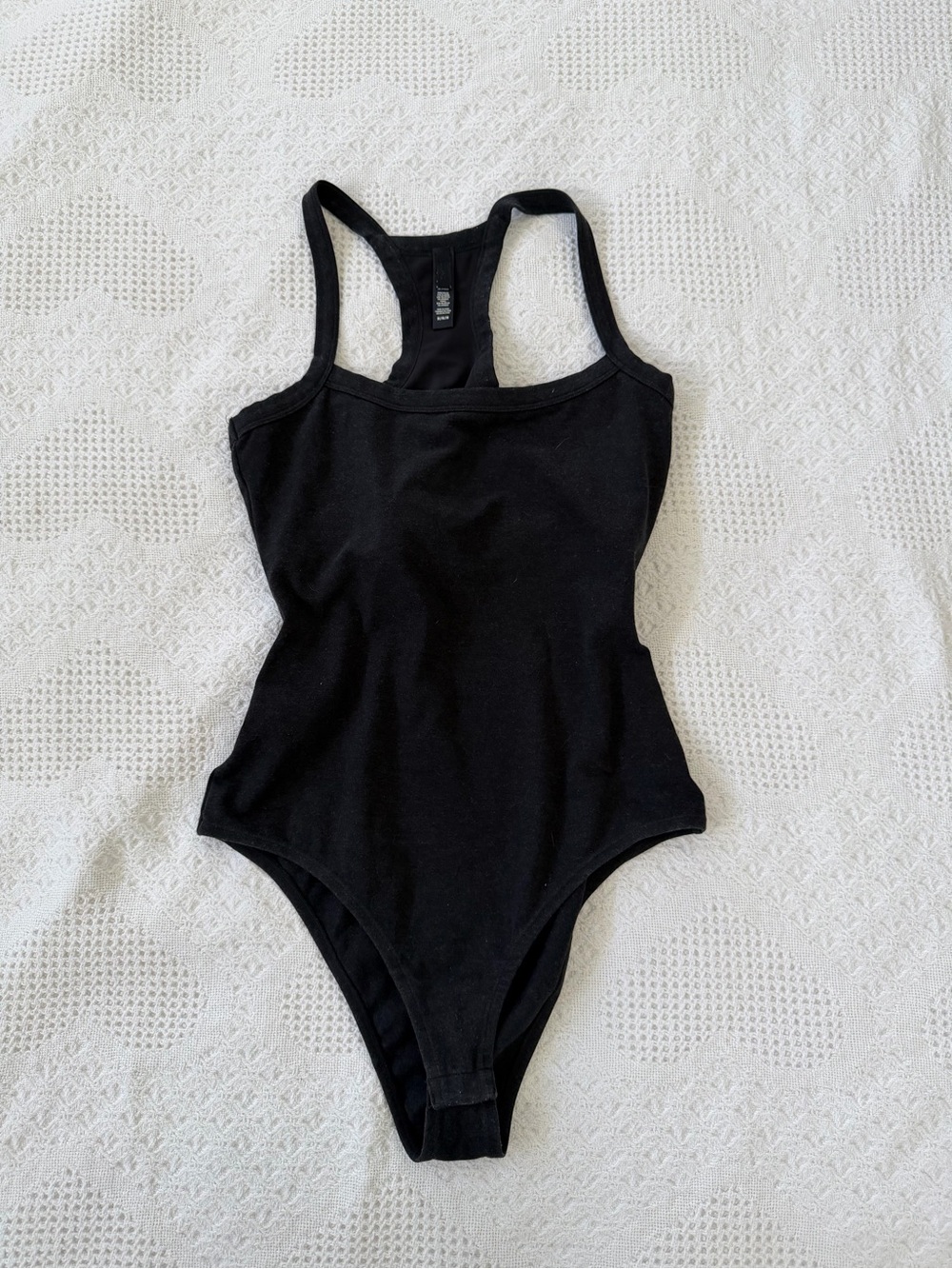 SKIMS Black Racerback One-Piece Bodysuit